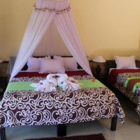 Mans Cottages&Spa Pemuteran Rum bild
