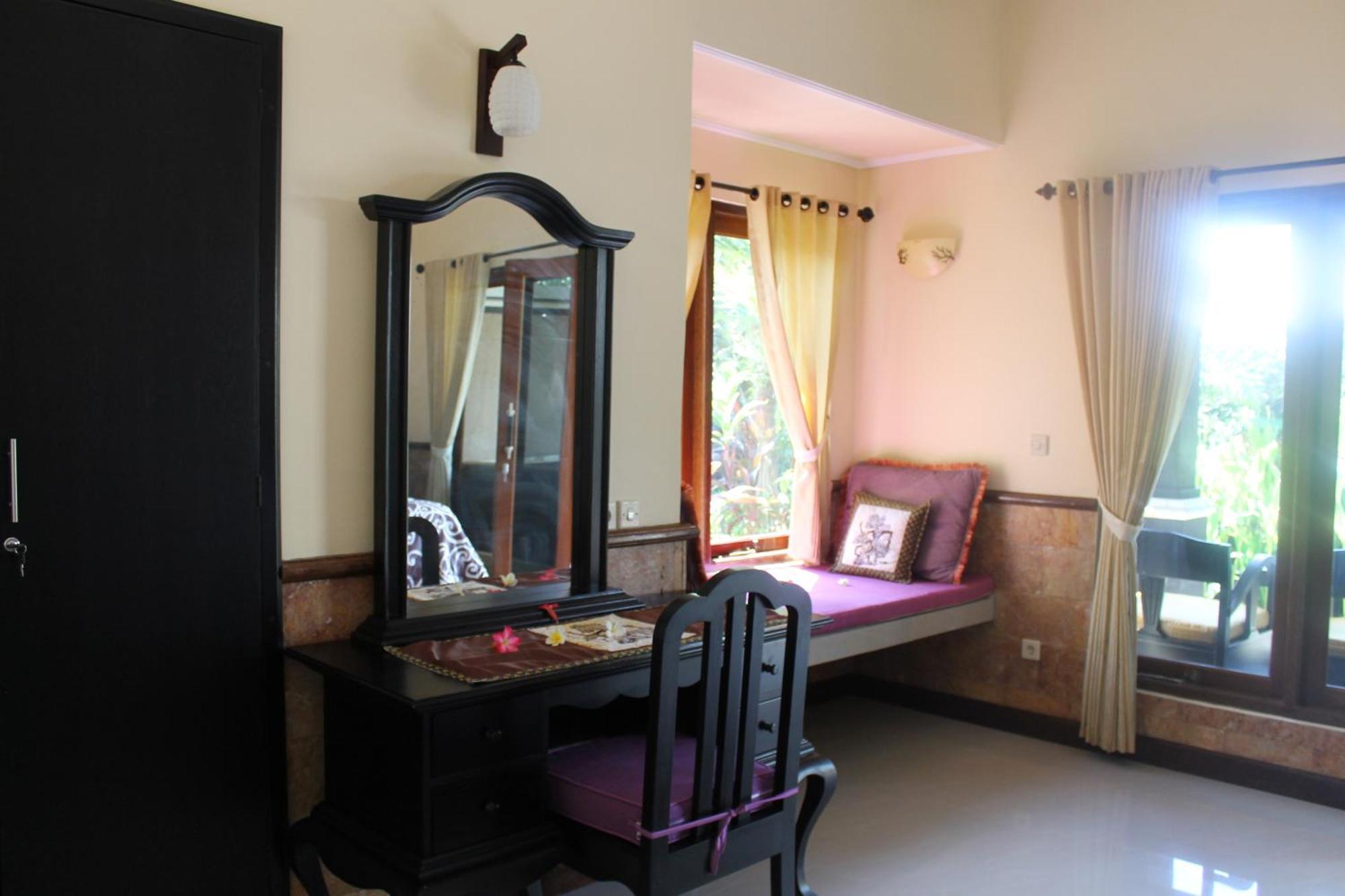 Mans Cottages&Spa Pemuteran Rum bild