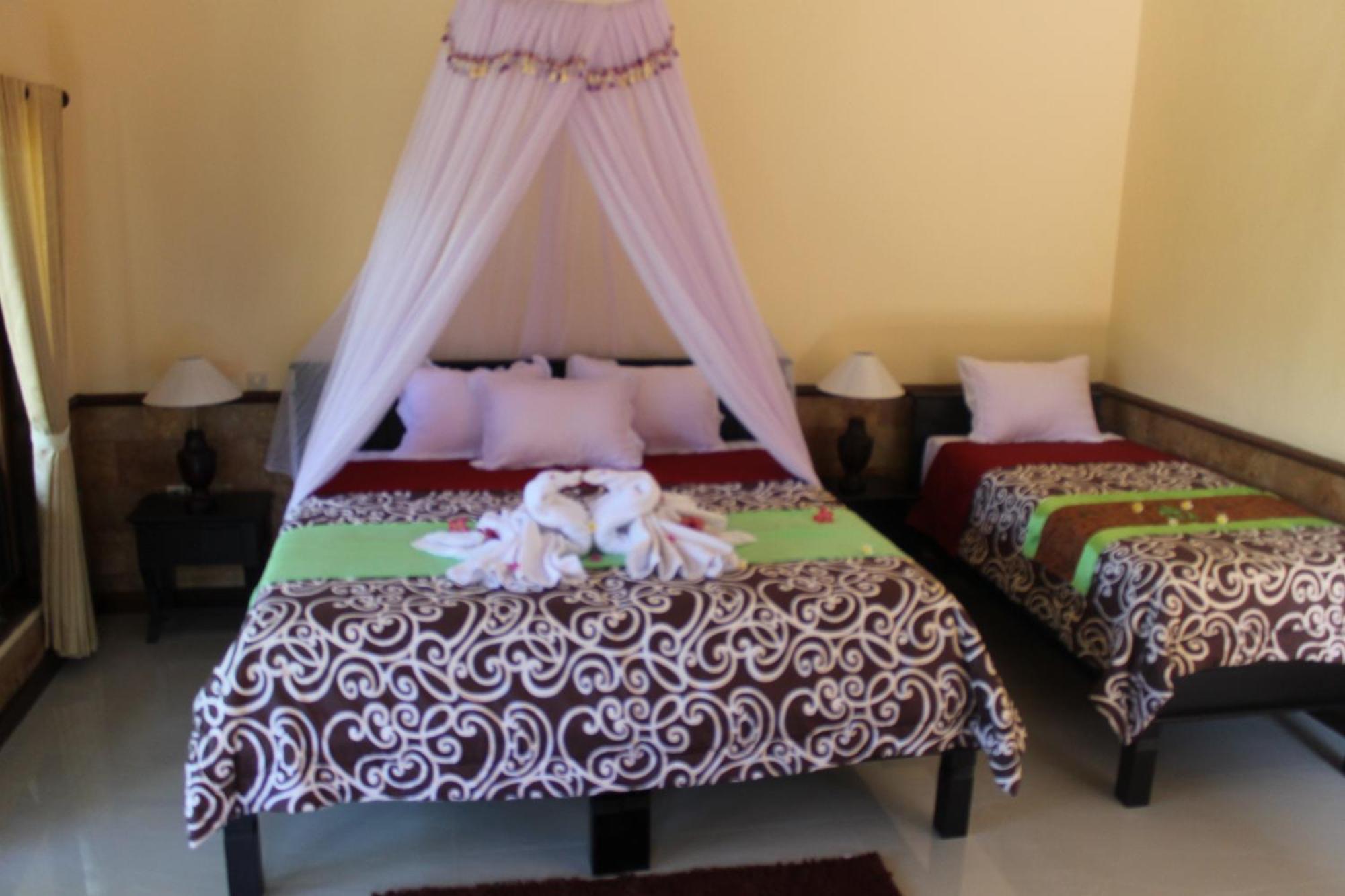 Mans Cottages&Spa Pemuteran Rum bild