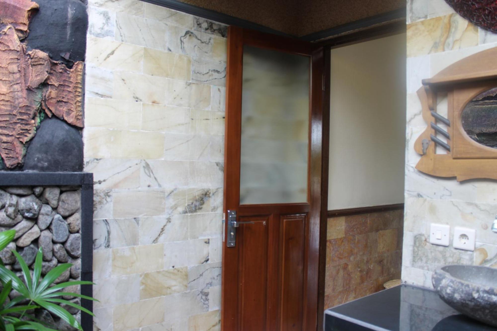 Mans Cottages&Spa Pemuteran Rum bild
