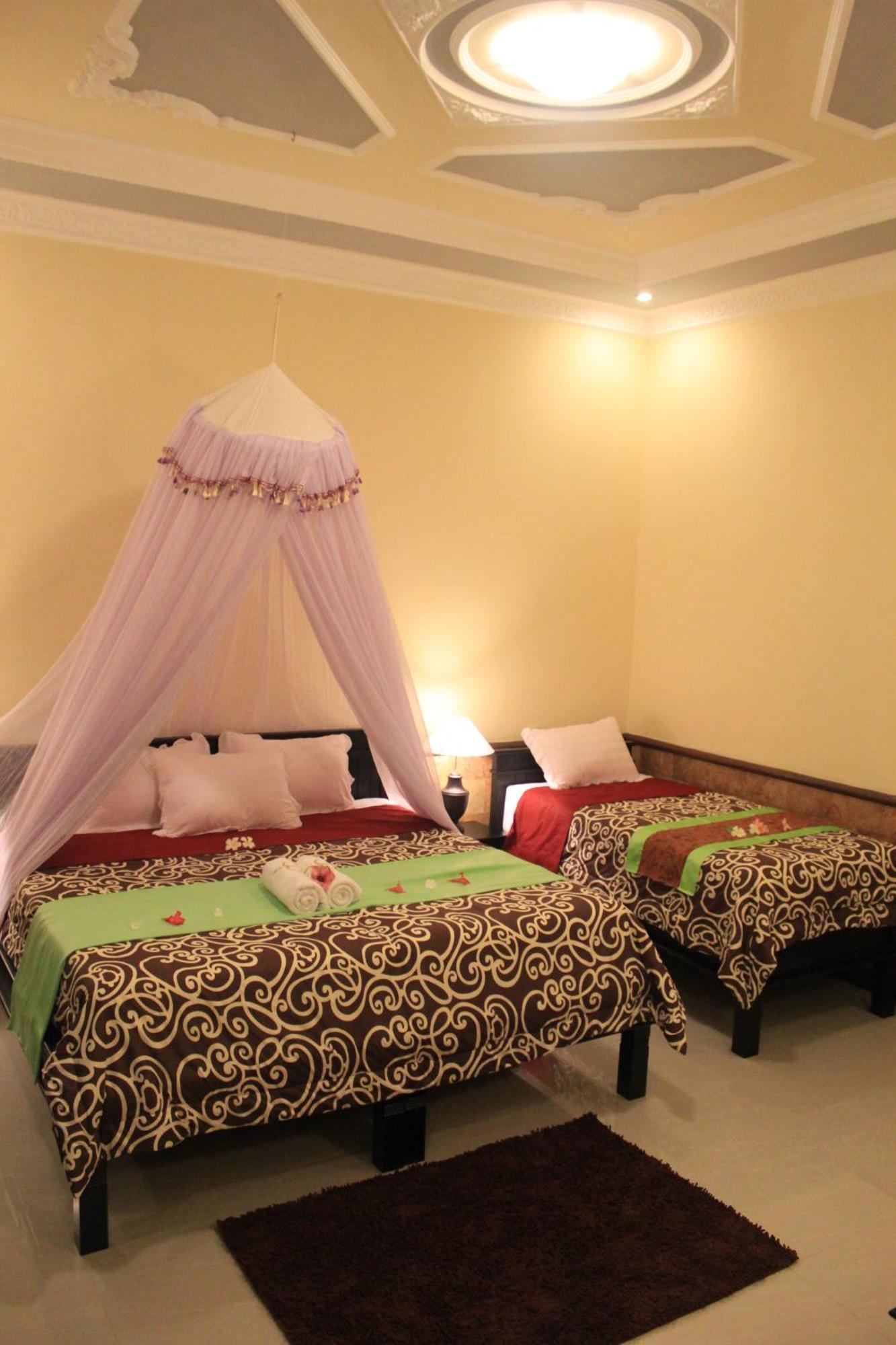 Mans Cottages&Spa Pemuteran Rum bild