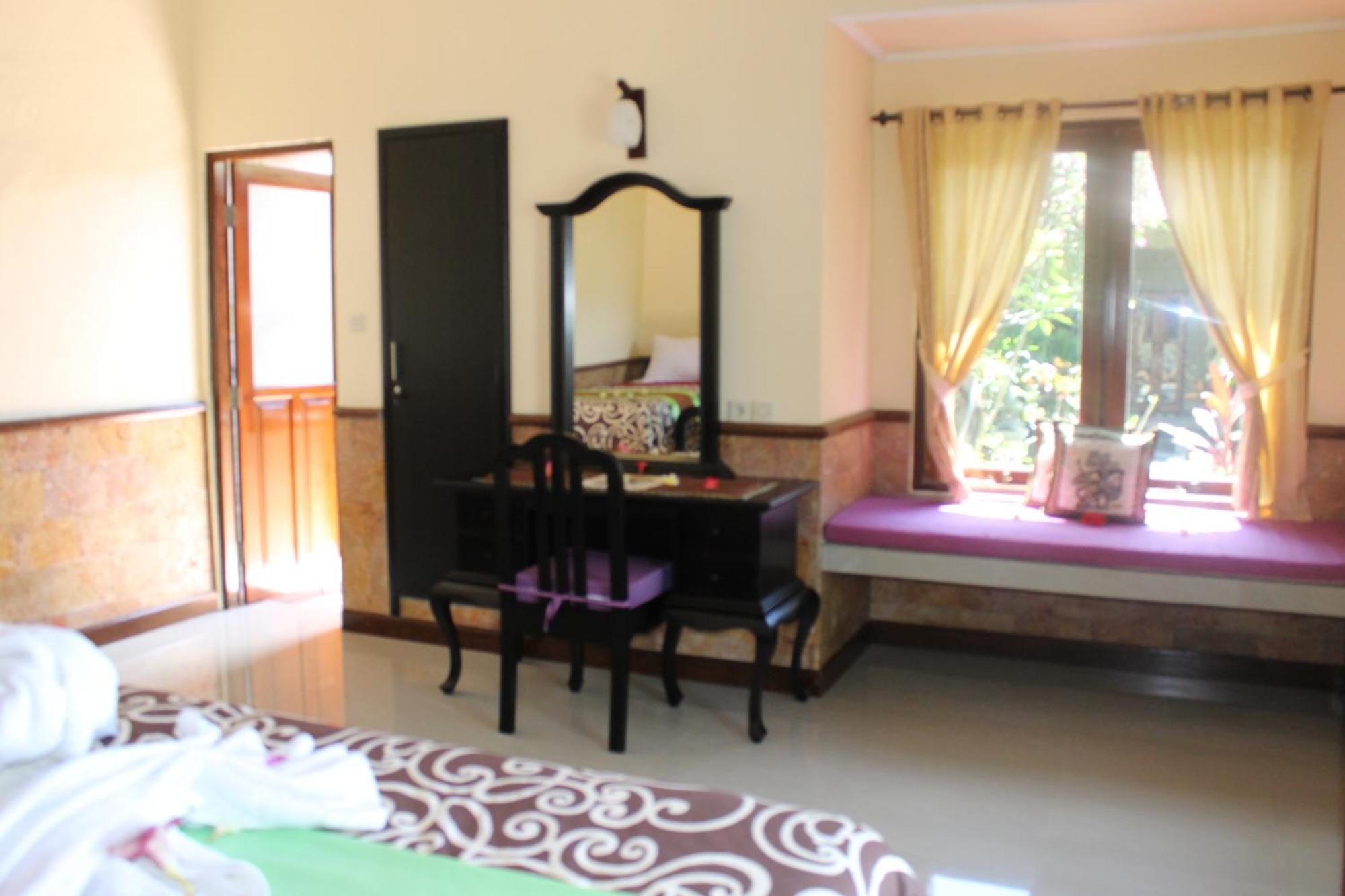 Mans Cottages&Spa Pemuteran Rum bild