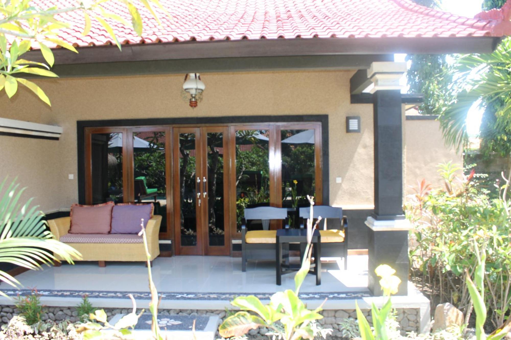 Mans Cottages&Spa Pemuteran Rum bild